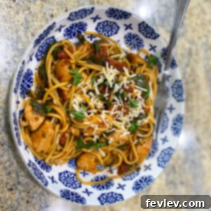 Delicious Chicken, Tomato, and Spinach Pasta served in a bowl