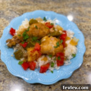 Delicious Sweet and Sour Chicken Legs in a Slow Cooker, served over rice