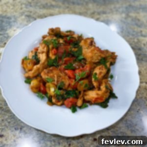 Delicious One-Pot Italian Chicken with juicy tomatoes and fresh spinach