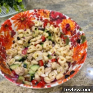 Delicious Tortellini Greek Pasta Salad, perfect for summer gatherings.