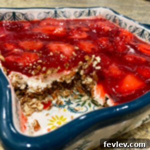 Delicious Strawberry Pretzel Dessert with layers of pretzel crust, creamy filling, and strawberry Jell-O