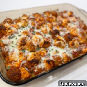 Delicious Meatball Sub Casserole with melted cheese and golden biscuits