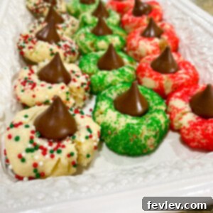 Shortbread Blossoms cookies with chocolate kisses and colorful sprinkles