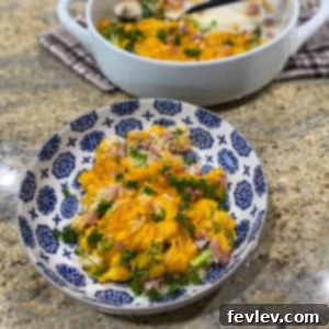 Delicious Ham, Broccoli, and Cauliflower Casserole in a baking dish, freshly baked