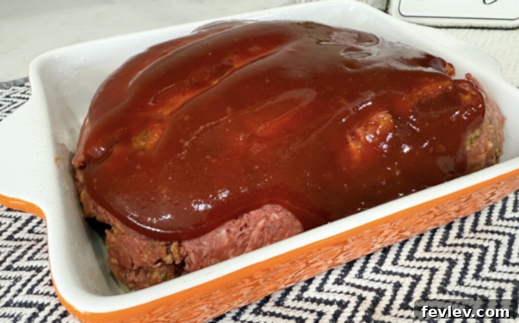 Stirring together ketchup, brown sugar, and Worcestershire sauce for the glaze.
