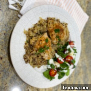 Delicious Chicken and Quinoa One-Pan Dinner with roasted vegetables in a large skillet, ready to serve.