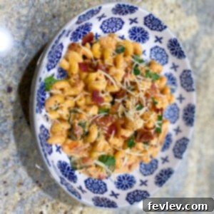 Delicious creamy pasta with chicken, bacon, and tomatoes, perfect for a quick dinner
