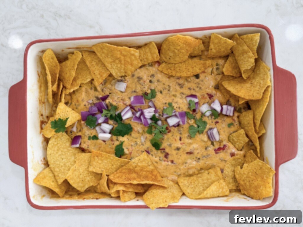 Epic Loaded Baked Queso 2 Delicious and easy loaded baked queso recipe
