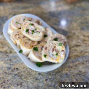 Delicious Chicken Bacon Ranch Pinwheels arranged on a serving platter, a perfect easy appetizer