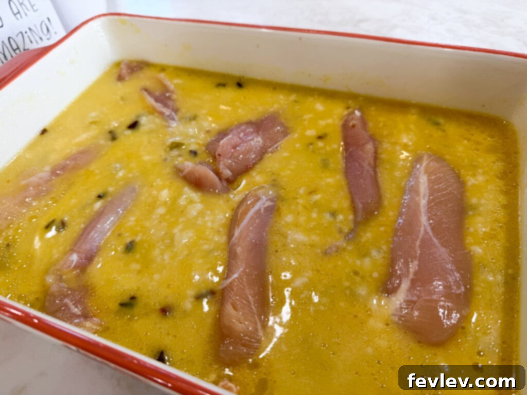 Golden Oven-Baked Chicken and Rice Delight 3 Mixing ingredients for easy no peek chicken