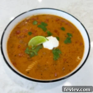 Delicious Queso Chili with homemade cheese sauce and ground beef