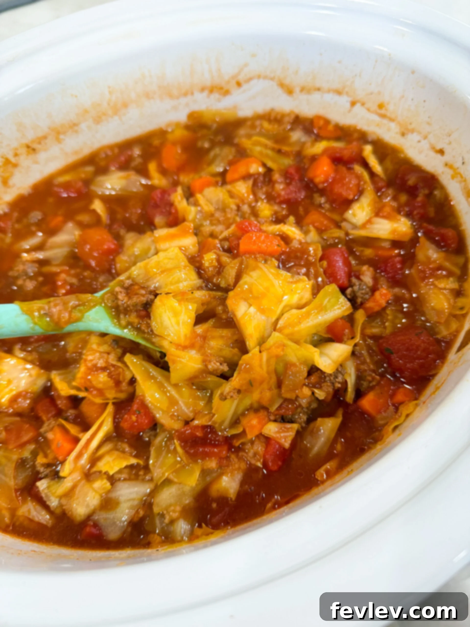 Rice stirred into slow cooker