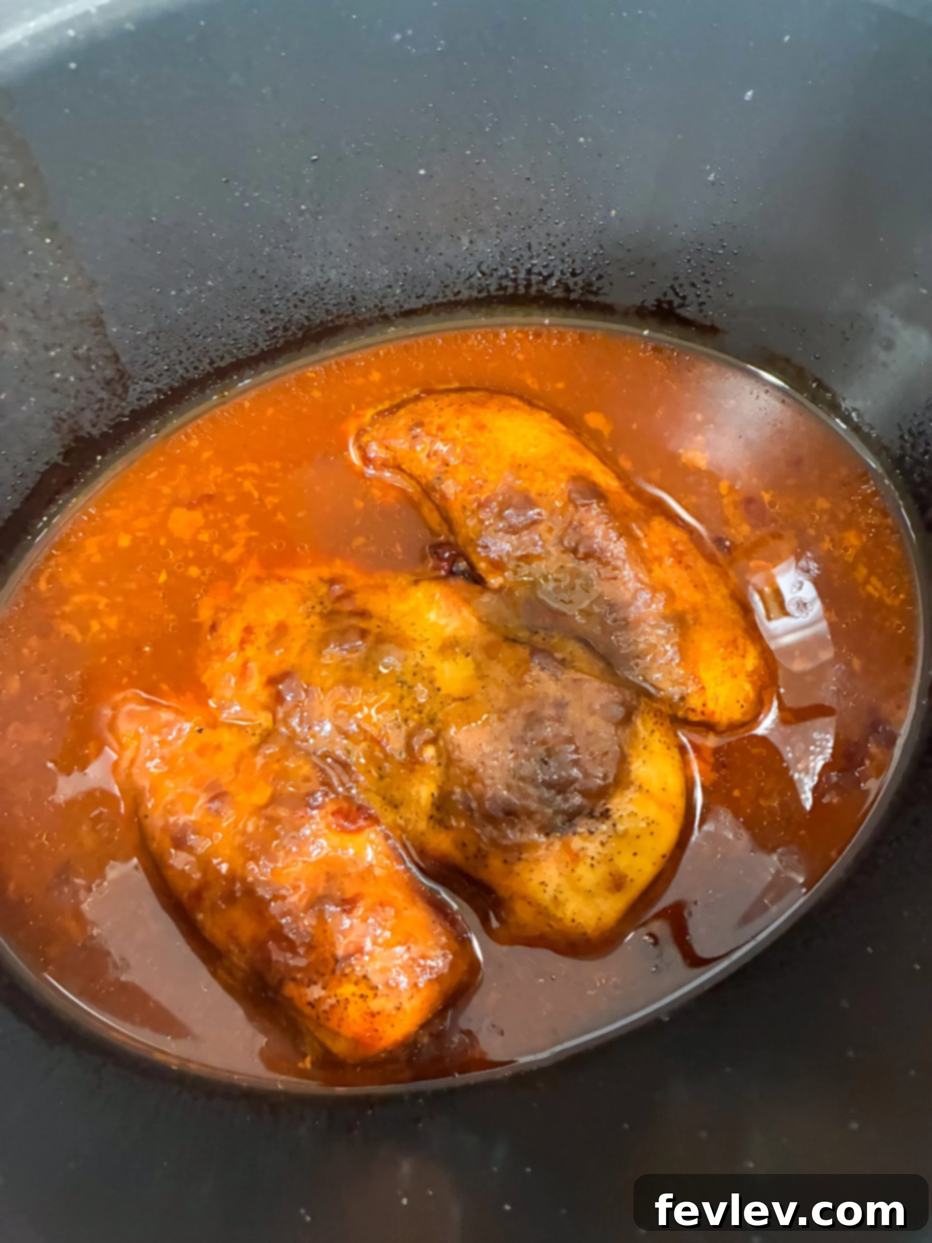 Cranberry chicken cooked until tender